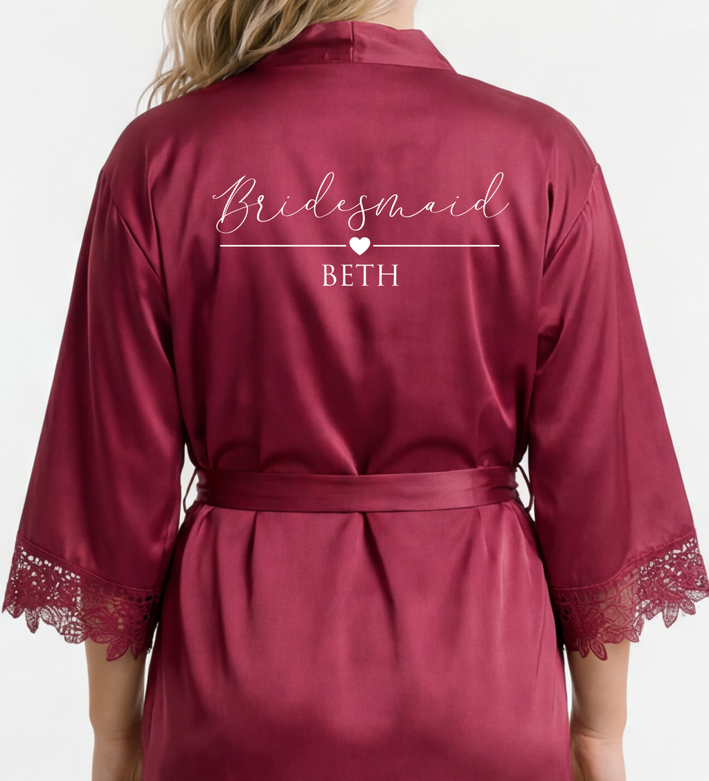 Maroon satin robe with 'Bridesmaid Beth' text on a white background