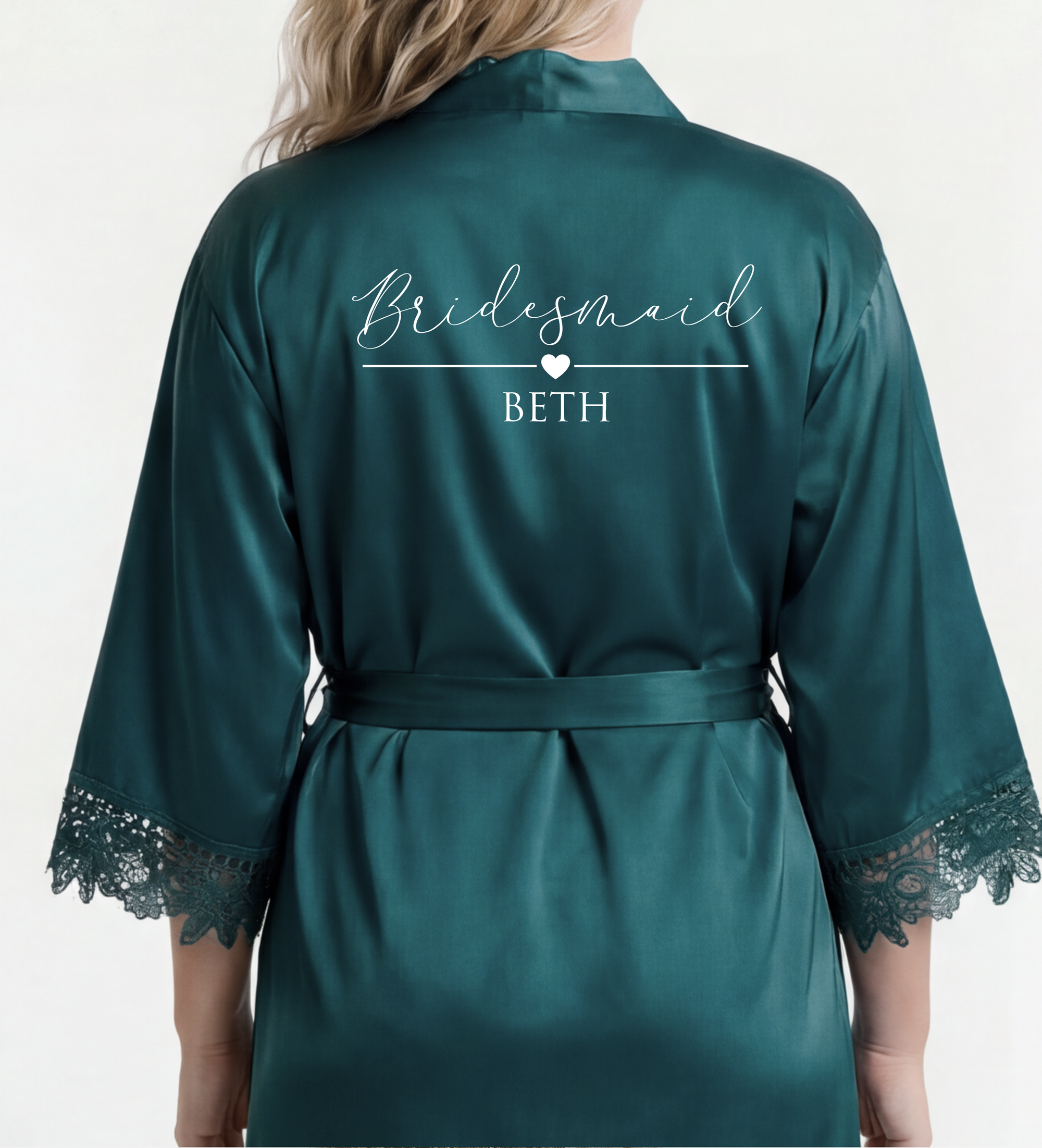 Teal satin robe with 'Bridesmaid BETH' text on a white background