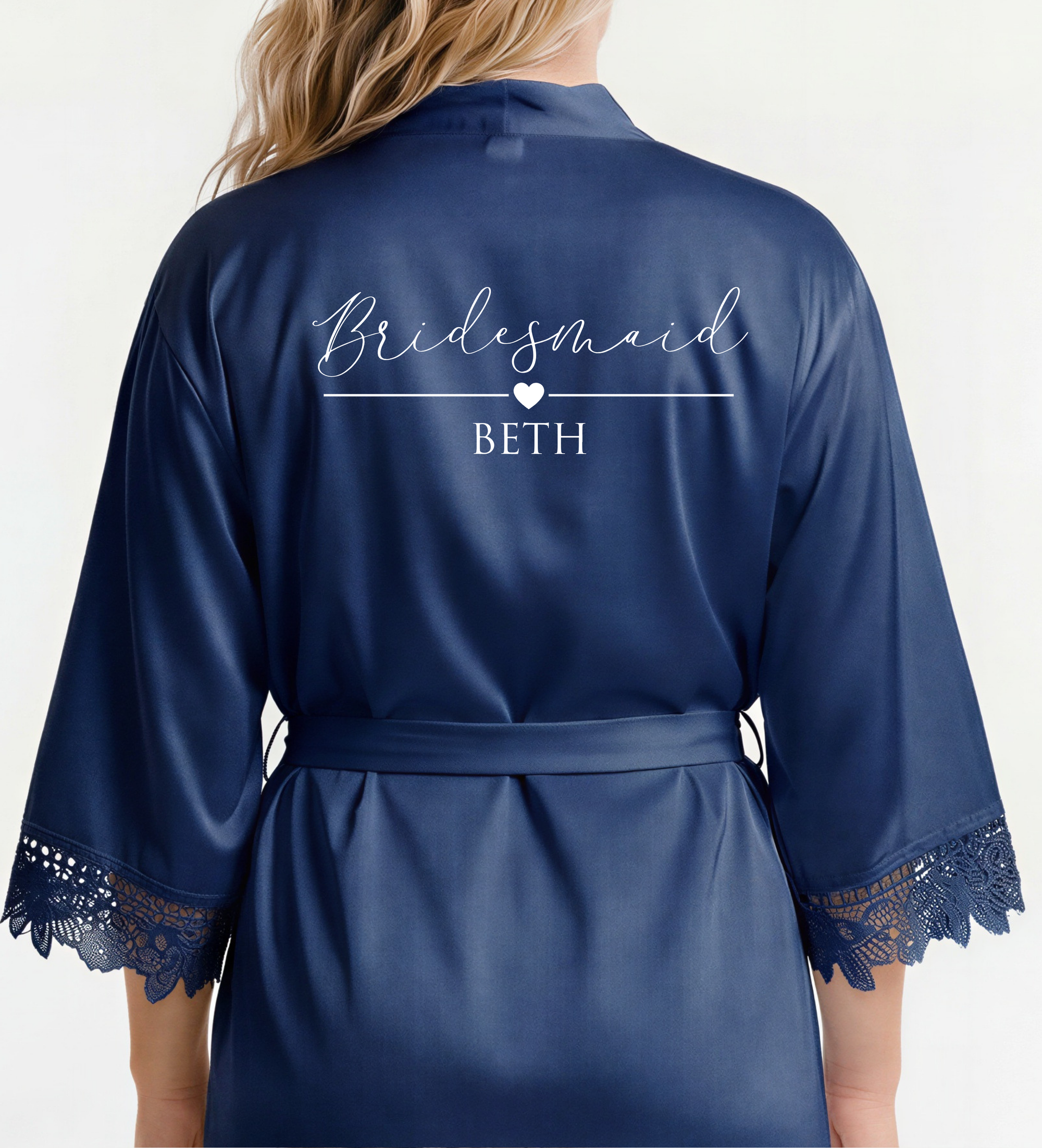 Navy satin robe with 'Bridesmaid BETH' text on a white background